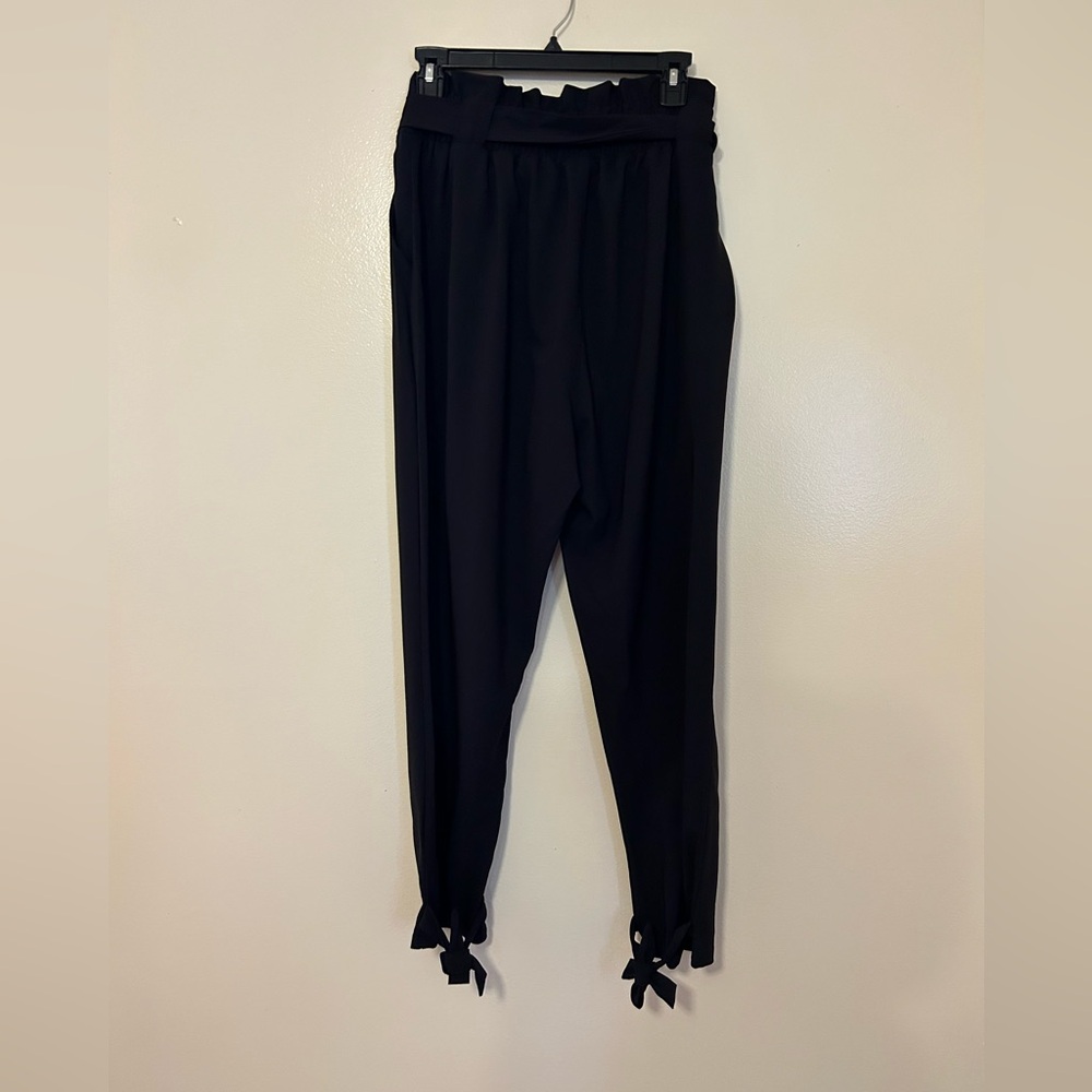 High Waist paper bag pants with pocket and bow knot detail at the ankle